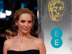 Actress Uma Thurman arrives at the British Academy of Film and Arts (BAFTA) awards ceremony at the Royal Opera House in London February 16, 2014.  REUTERS/Suzanne Plunkett