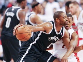 Alan Anderson of the Brooklyn Nets drives against Kyle Lowry of the Raptors in Game 1 on April 19. (Veronica Henri, Toronto Sun)