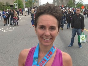 Linda Houle-Robert, who has mulitple sclerosis is  shown here at May 2013's  Ottawa Race Weekend. She will run the Boston Marathon Monday, April 21, 2014 and is raising money to help others with MS.
Submitted photo
OTTAWA SUN/QMI AGENCY