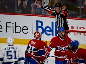 Referee Francis Charron waves off a goal by the Tampa Bay Lightning during the second period on April 20, 2014, in Montreal. (MARTIN CHEVALIER/QMI Agency)