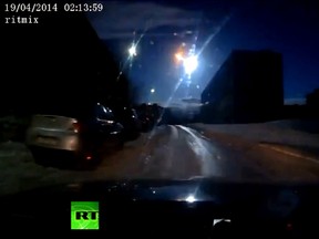 Video shows a meteor lighting up the night sky in Russia. (YouTube screengrab)