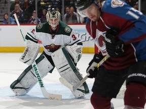 Goalie Darcy Kuemper #35 of the Minnesota Wild defends the goal after entering the game in the second period against the Colorado Avalanche Game Two of the First Round of the 2014 NHL Stanley Cup Playoffs at Pepsi Center on April 19, 2014 in Denver, Colorado. (Doug Pensinger/Getty Images/AFP)