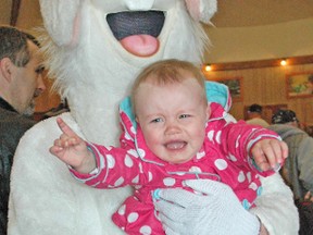 Kennedy Cronin lets her parents know she isn't too happy to meet the Easter Bunny during the Mitchell & District Kinsmen's Easter Egg-stravaganza Saturday morning, April 19, at the Crystal Palace. Music, children's activities, Easter chocolate and treats, a petting zoo that included baby chicks, a rabbit, a calf and the Easter Bunny himself were all a part of the festivities during the annual event. KRISTINE JEAN/MITCHELL ADVOCATE