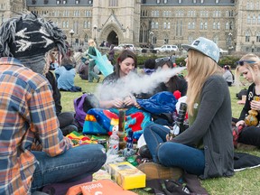 A group of friends Abby, Devin, Corey and Adrianna attend the 420 Ottawa Fill the Hill protest at Parliament Hill on Sunday, April 20, 2014. 
Sarah Taylor/Ottawa Sun/QMI Agency