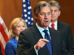 Canada's Ambassador to the US Gary Doer speaks during a a press conference on  the Keystone XL pipeline in the Dirksen Senate Office Building on February 4, 2014 in Washington, DC. AFP PHOTO/Mandel NGAN
