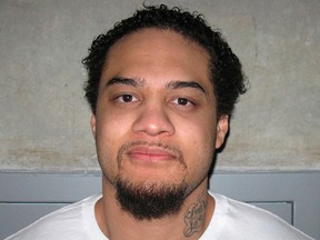 Siale Angilau, 25, an accused street gang member, is seen in a picture provided by the Utah Department of Corrections taken in February, 2012. Angilau was shot and killed by marshals on April 21, 2014, when he attacked a witness who was testifying against him in federal court in Salt Lake City, federal law-enforcement officials said. REUTERS/Utah Department of Corrections/Handout via Reuters