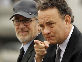 Steven Spielberg (L) and actor Tom Hanks.

REUTERS/Jason Reed