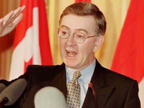 Reform Party Leader Preston Manning makes a point while talking to reporters in Ottawa, February 7, 1996. (QMI Agency, file))
