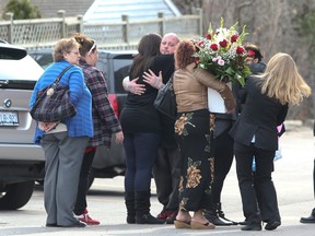 Family and friends of Andrea White, who was shot and killed April 12, come together at the Jerrett Funeral Home on Kennedy Rd. in Toronto on Monday, April 21, 2014. (Dave Thomas/Toronto Sun)