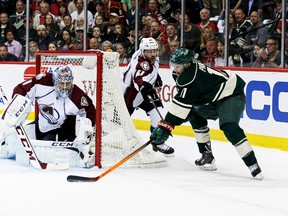 Minnesota Wild forward Zach Parise with a wraparound attempt on Colorado Avalanche goalie Semyon Varlamov during Game 3 of their Western Conference quarterfinal series at the Xcel Energy Center in St. Paul, Minn., April 21, 2014. (BRACE HEMMELGARN/USA Today)