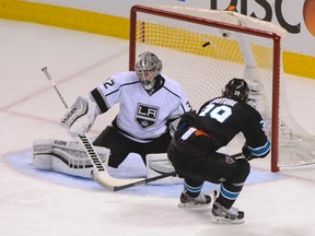 Kings goaltender Jonathan Quick was pulled from Game 2 against the Sharks. (REUTERS)