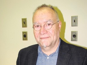 University of Windsor chemist Bulent Mutus holds samples of chitosan that were tested in his lab to filter phosphorus and micronutrients from wastewater. Encouraged by promising results, the method will be tested this growing season in the field.