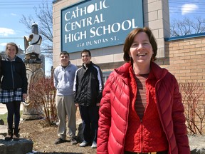 Catholic Central high school Geography Club students Kate Cormier (left), Dani Venerus, Kolton Smith and Majd Radhaa join Julie Ryan, director of programs, ReForest London, outside April 16, 2014. The CCH students hope to be among the first to apply for ReForest London’s new School Community Tree Challenge. CHRIS MONTANINI\LONDONER\QMI AGENCY