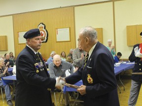 Legion president Jerry Lava receives the Legionnaire of the Year award at the Kenora Legion’s annual general meeting on Monday night, April 21.