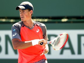 Vasek Pospisil was upset by Romanian qualifier and world No. 118 Adrian Ungur at the Bucharest International on Tuesday. (Matthew Stockman/Getty Images/AFP/Files)