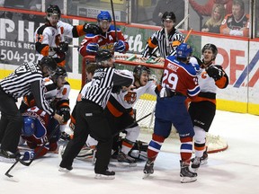 The Medicine Hat Tigers and Edmonton Oil Kings jostle in front of the net during the first period of Tuesday's game at the Arena in Medicine Hat. (Emma Bennett, Medicine Hat news)
