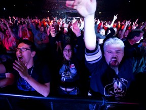 Fans cheer as Black Sabbath performs at Rexall Place in Edmonton, Alta., on Tuesday, April 22, 2014. The English band are touring in support of their latest album 13. Ian Kucerak/Edmonton Sun/QMI Agency