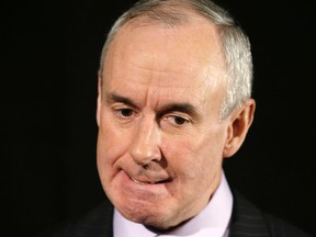 Ron MacLean talks with media at a Rogers press conference on March 10, 2014. (Craig Robertson/Toronto Sun/QMI Agency)