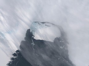 The B-31 Iceberg is seen after separating from a rift in Antarctica's Pine Island Glacier in this NASA Earth Observatory handout image acquired on November 13, 2013. (REUTERS/NASA Earth Observatory/Holli Riebeek/Handout via Reuters)