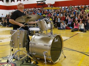 Mitch Dorge, a Winnipeg drummer who performed with the Crash Test Dummies, plays for students at Northern Collegiate in Sarnia Wednesday after delivering a motivational message about following dreams, and making responsible decisions. He was scheduled to repeat the message Thursday at St. Clair Secondary School and then attend an evening charity event for Cystic Fibrosis Canada at Jack Doyle's. PAUL MORDEN/THE OBSERVER/QMI AGENCY