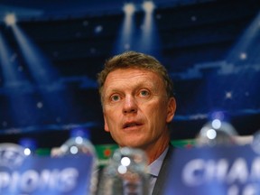 Manchester United manager David Moyes attends a Champions League news conference at Old Trafford in Manchester March 31, 2014. (REUTERS/Stefan Wermuth)