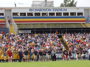 A portion of the bleachers at Richardson Stadium at Queen's University in Kingston sits empty at the Golden Gaels home opener against the McMaster Marauders on Sept. 2, 2013 after it was condemned by engineers. Queen's announced on Wednesday April 23, that $15 million of the $25 million needed for a revitalization project for the stadium has been raised. 
IAN MACALPINE/KINGSTON WHIG-STANDARD/QMI AGENCY