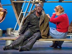 Phillips, played by Anderson Ryan Allen, middle, argues over the amount of room on boats with Bergeron, played by Clint Butler, left, as they cling to their own sinking ship with Langston, played by Mike Payette, in Oil and Water at The Grand Theatre. (CRAIG GLOVER, The London Free Press)