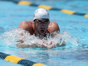 Michael Phelps practices for the Arena Grand Prix at the Skyline Aquatic Center on April 23, 2014 in Mesa, Ariz. (Christian Petersen/Getty Images/AFP)