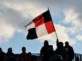 Fans Cheer on the Ottawa Fury FC during their NASL soccer match against FC Edmonton at Carleton University in Ottawa on Wednesday, April. 23, 2014. (Matthew Usherwood/ Ottawa Sun)