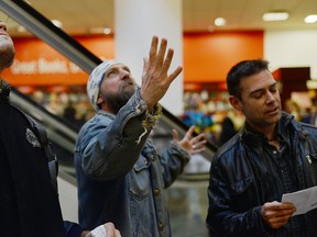 Scott Florence and his fellow Romeo enactors perform a flash mob scene from Romeo and Juliet at Chapters to celebrate Shakespeare's 450th birthday. Sarah Taylor/Ottawa Sun/QMI Agency