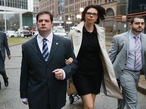 Toronto Const. James Forcillo, wife Irini and lawyer Peter Brauti arrive at Old City Hall Tuesday, April 22, 2014, for his preliminary hearing for second-degree murder charge in Sammy Yatim shooting on TTC streetcar. (Stan Behal/Toronto Sun)