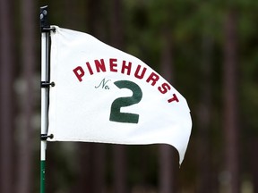A flag blows in the wind at Pinehurst No. 2, the site of this year's U.S. Open. (Streeter Lecka/Getty Images/AFP)