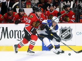 Chicago Blackhawks centre Jonathan Toews battles for the puck with St. Louis Blues left wing Alexander Steen during Game 4 of their Western Conference quarterfinal series at the United Center in Chicago, April 23, 2014. (JERRY LAI/USA Today)