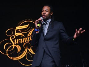 NFL player Richard Sherman onstage at Club SI Swimsuit hosted by Sports Illustrated at LIV Nightclub at Fontainebleau Miami Beach on February 19, 2014 in Miami Beach, Florida. (Neilson Barnard/Getty Images for Sports Illustrated/AFP)
