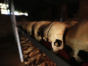 Preserved skulls are spread out on a metal shelf in a Catholic church in Nyamata April 9, 2014.  Hundreds who sought refuge within the church compound were brutally killed during mass killings that lasted three months in the 1994 genocide in Rwanda. 
REUTERS/QMI AGENCY