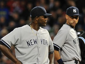 Yankees pitcher Michael Pineda (left) is ejected in the second inning of Wednesday's game for having a foreign substance on his neck in a game against the Red Sox in Boston. (Bob DeChiara/USA TODAY Sports)
