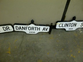 These decommissioned street signs are among those up for auction. (photo courtesy the City of Toronto)