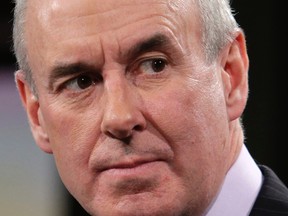 Ron MacLean reacts during a Rogers press conference on March 10, 2014. (Craig Robertson/Toronto Sun/QMI Agency)