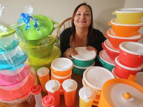 Noelle Jolicoeur, Tupperware director in Winnipeg, with a mountain of Tupperware. A giant Tupperware party is planned for Club Regent; instead of money, Tupperware will be donated to Osborne House. (Chris Procaylo/Winnipeg Sun)