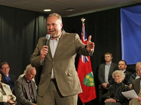 Prince Edward-Hastings MPP Todd Smith speaks as provincial PC leader Tim Hudak looks on.