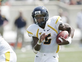 Pat White, shown here in action at West Virginia in 2007, has had stints with the Dolphins and Redskins organizations. (Reuters)