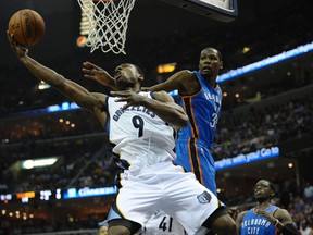 Memphis Grizzlies guard Tony Allen lays the ball up against Oklahoma City Thunder forward Kevin Durant during Game 3 of their Western Conference quarterfinal series FedEx Forum in Memphis, April 24, 2014. (JUSTIN FORD/USA Today)