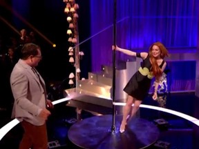 Lindsay Lohan gives a pole dancing lesson on a U.KI. talk show. (YouTube.com)