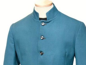 A fireman-style jacket once owned by John Lennon is to go on sale at auction.(WENN)