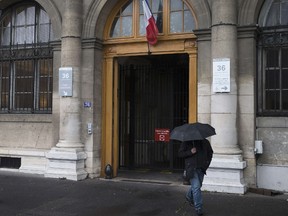 Four French police officers are being held in custody on suspicion of raping a 34-year-old Canadian woman at their Paris station. 

AFP PHOTO / JOEL SAGET