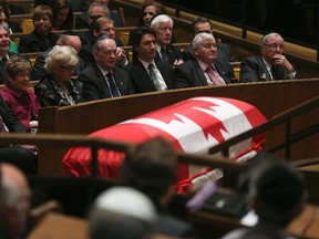 (Front L-R) Governor General David Johnston, his wife Sharon, Supreme Court of Canada chief justice Beverley McLachlin, former prime minister Jean Chretien, Liberal Leader Justin Trudeau, former prime minister John Turner and former Canadian Prime Minister Paul Martin attend the funeral of former MP Herb Gray in Ottawa April 25, 2014. REUTERS/CHRIS WATTIE