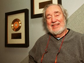 Jack Richardson, legendary record producer, stands in front of a couple of his many gold records. (Free Press file photo)