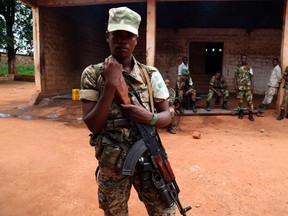 A Seleka soldier poses for a picture at the Seleka headquarters in the town of Bambari April 22. 
REUTERS/QMI AGENCY