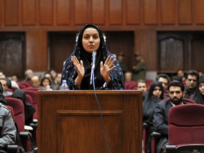 A picture taken on December 15, 2008 at a court in Tehran shows Iranian Reyhaneh Jabbari speaking to defend herself during the first hearing of her trial for the murder of a former intelligence official. (AFP PHOTO/GOLARA SAJADIAN)