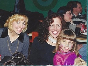 Hand in photo of  Sharon Dempster has blonde hair, Susan Lipkus and Rebecca Sapiano